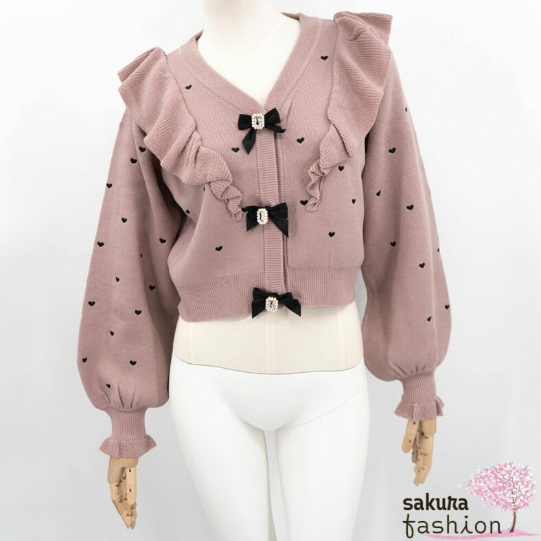 Rojita Cardigan Strickjacke Rosa Herzmuster Rüschen Schleifen Schmucksteine Voluminöse Ärmel Japan Kawaii heart dot short knit cardigan pink